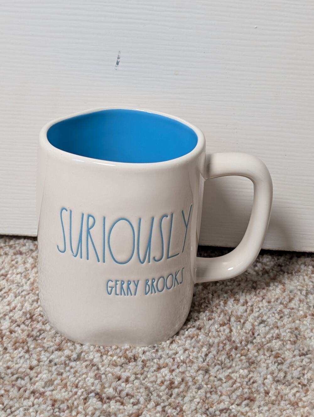 Rae Dunn SURIOUSLY Gerry Brooks Coffee Mug Cream Blue Ceramic Magenta 16 oz